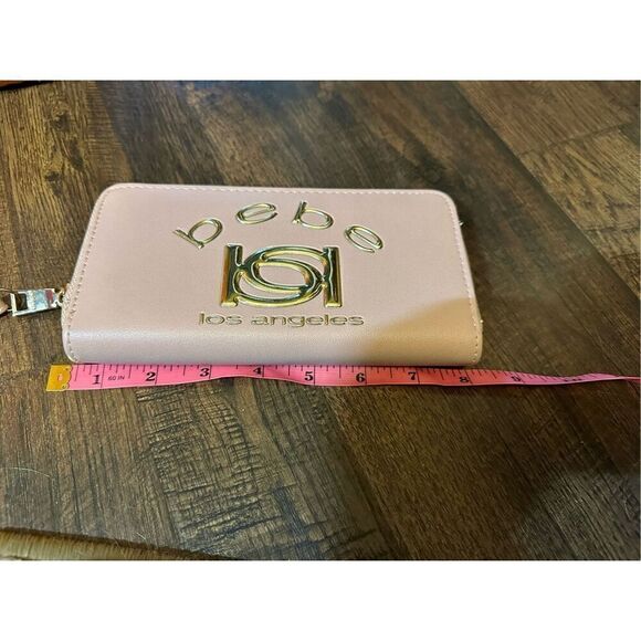 BEBE Pink and gold, large wristlet. Lots of room never used. - Picture 5 of 10